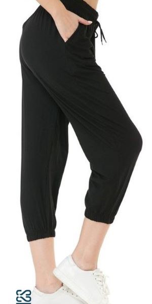 Lady wearing Solid Black Capri Joggers from KISS My Legs in Edmonton, Alberta